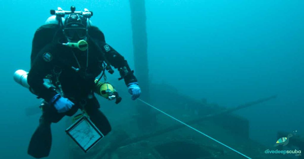 Twin Diver along a line above a wreck