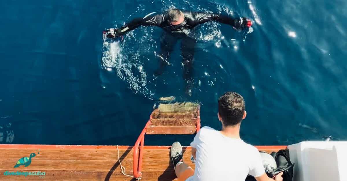Why Do Scuba Divers Fall In Backwards?